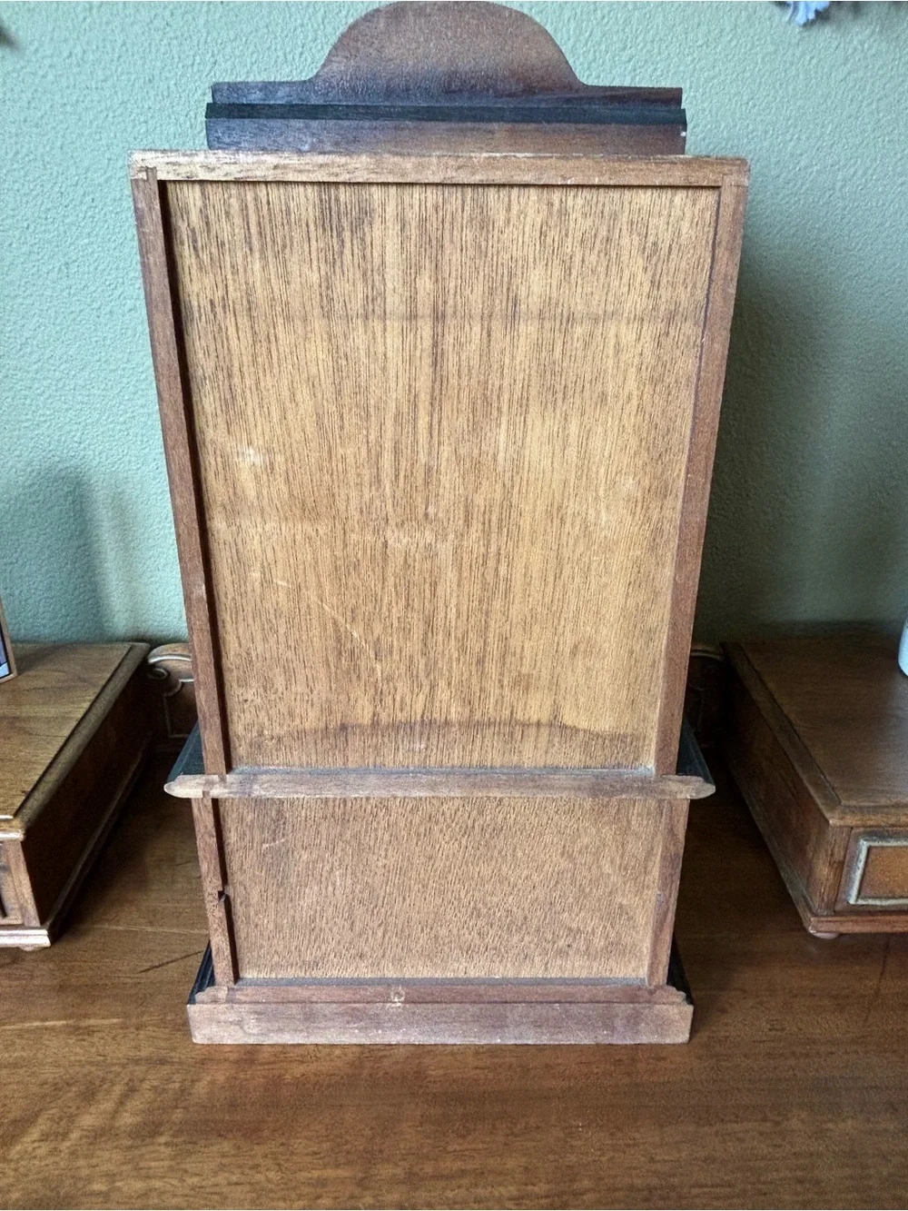 Antique wood jewelry box with drawers and metal hardware